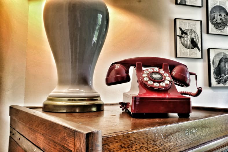 rotary telephone on desk