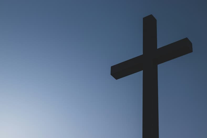 black cross with blue background