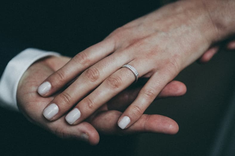 hand with painted fingernails