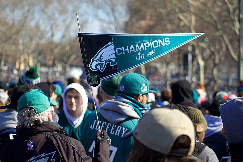 eagles fans with champions flag
