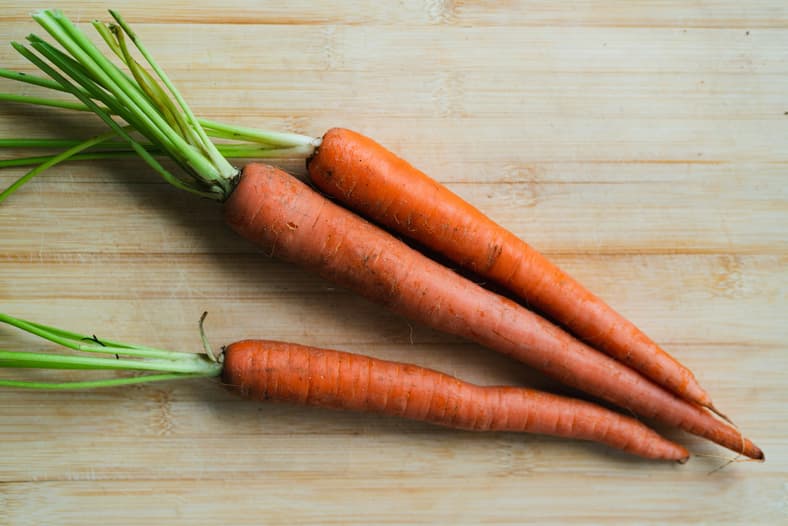 carrots on wooden table